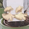 Big Leafy Golden Stud Earrings - Image 3