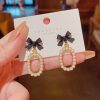 Bowknot With Hanging Pearls Earrings - Image 3
