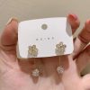 Exquisite Gold Flower Earrings - Image 3