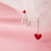 Exquisite Mismatched Heart Beat Earrings - Image 3