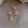 Gold Fish Tail With Pearls Korean Earrings - Image 2