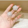 Hollow Korean Big Bow Long Clip Earrings - Image 2