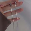 Long Cross Chopstick Earrings - Image 2