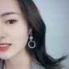 Mismatched Korean Purple Miss Universe Earrings - Image 2