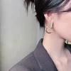 The Entangled Round Shiny Earrings - Image 4