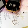 The Floating Shining Heart Mismatched Earrings - Image 2