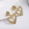 Gold Hanging Geometric Heart Earrings - Image 2