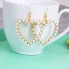 Korean Heart Pearl Earrings - Image 3