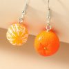 The Mismatched Orangy Earrings - Image 2