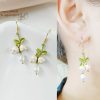 White Lily With Green Leaf Earrings - Image 3