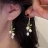 White Lily With Green Leaf Earrings - Image 2
